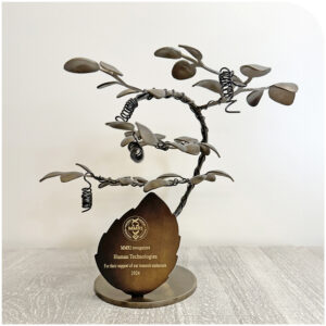 A bronze sculpture with leaves.